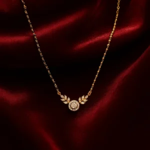 Stylish leaf motif mangalsutra with round centerpiece and gold polish