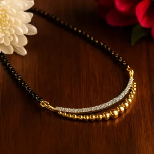Dual row mangalsutra with shimmering diamonds and polished golden beads
