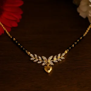 Leaf motif mangalsutra with American diamonds and golden heart charm