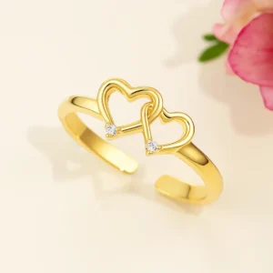 Romantic double heart gold ring with diamond detail