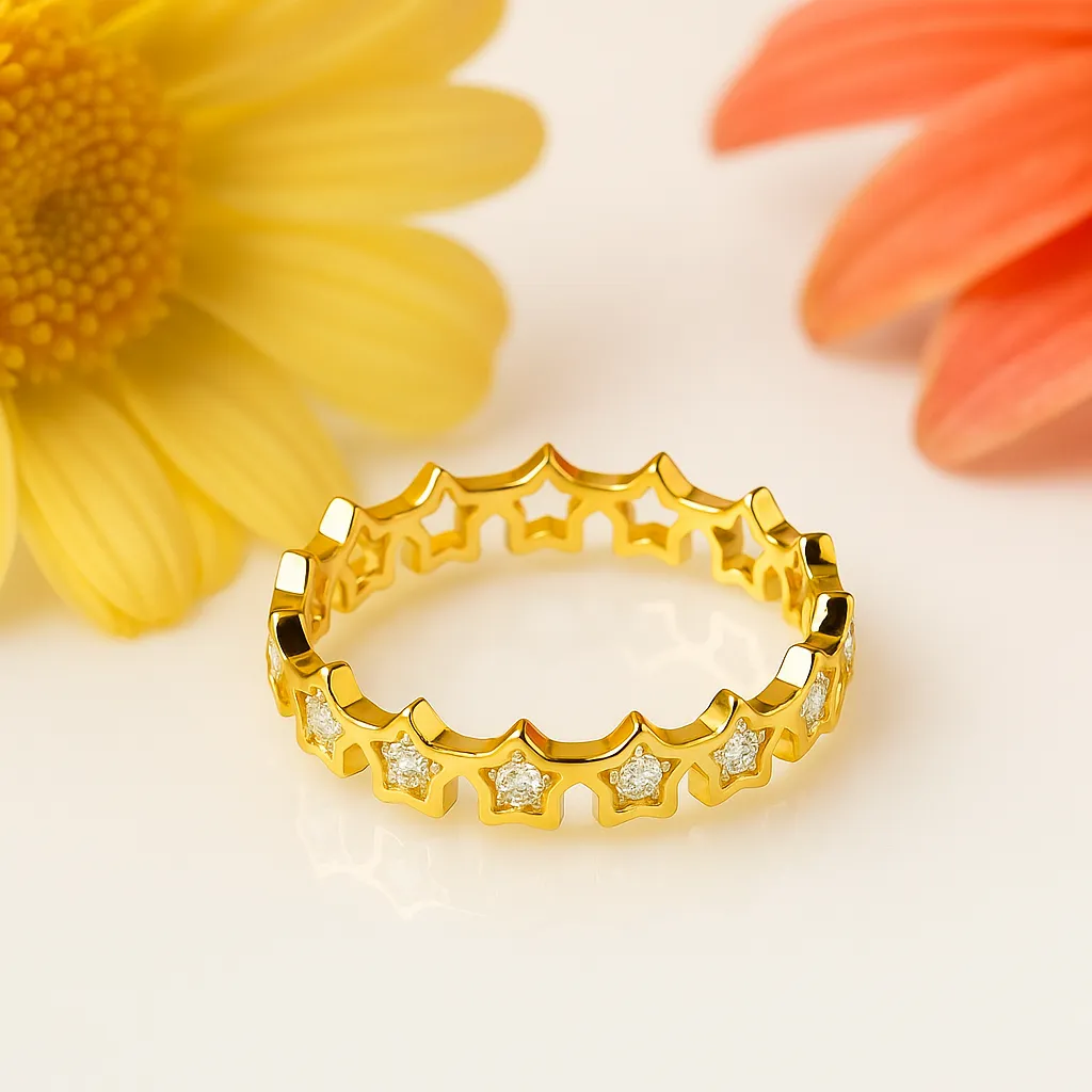 Star motif gold polish ring with diamond accents for festive elegance